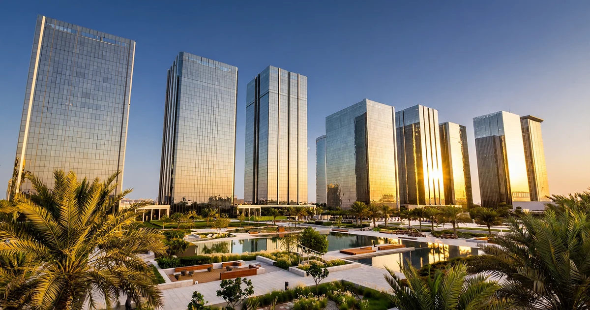 Modern glass media district towers at golden hour — tax consultants for Dubai Media City companies